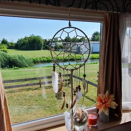 Ferienhaeuschen Nr 80 Am Kanal Ferienpark De Watersnip Holiday home